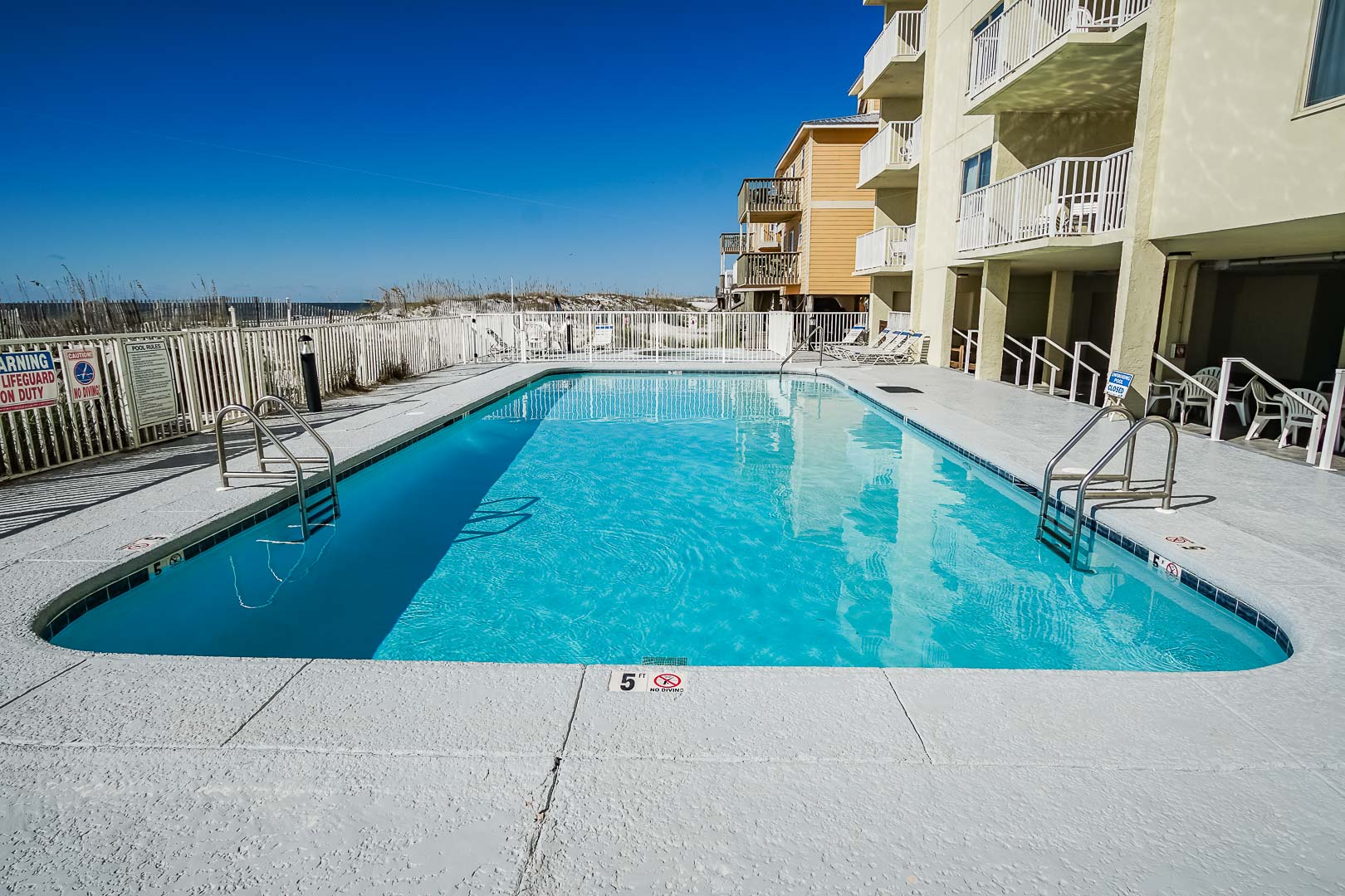 An expansive swimming pool at VRI's Shoreline Towers in Gulf Shores, Alabama.